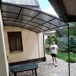 Навес над входом из поликарбоната или металла,  навес над машиной