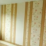 Поклейка шпалер на стіни 