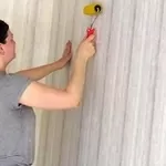 Поклейка обоев Шпаклевка стен Киев