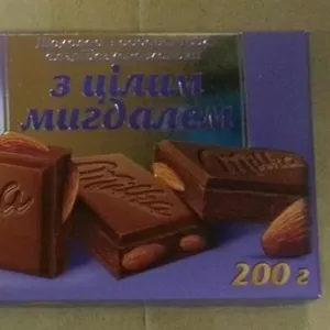 Шоколад Milka молочный целый миндаль 200г. оригинал