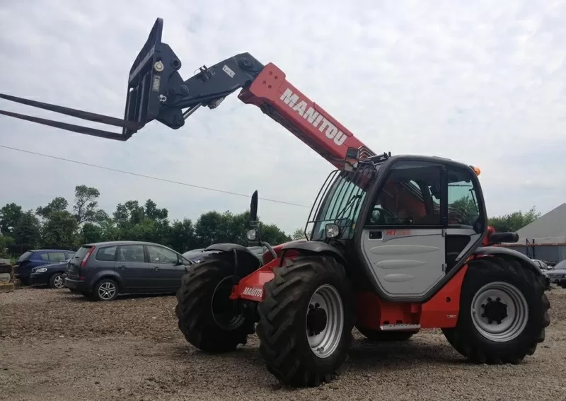 Телескопический погрузчик Manitou MT 732(2012)