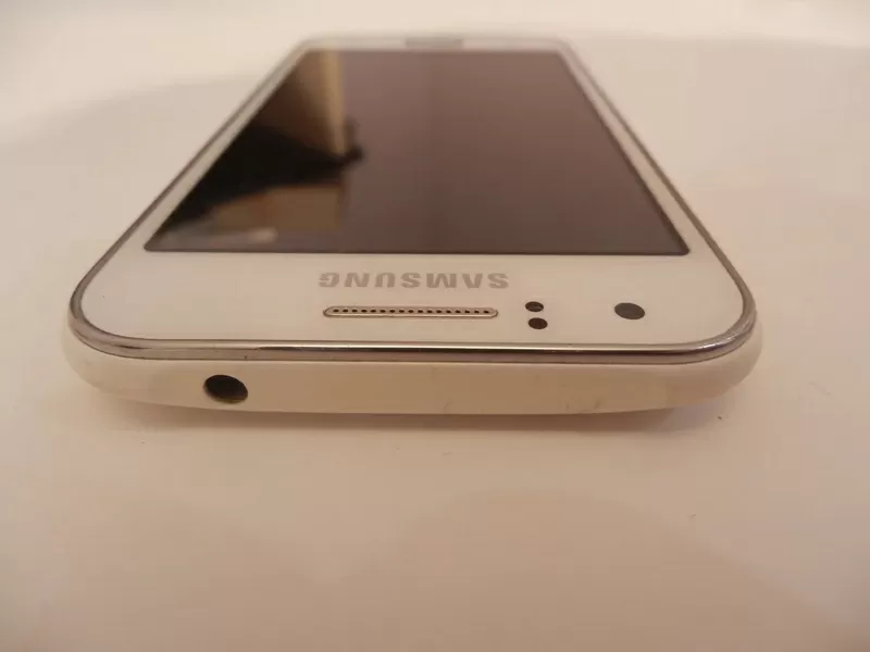 Мобильный телефон Samsung SM-J100H 3