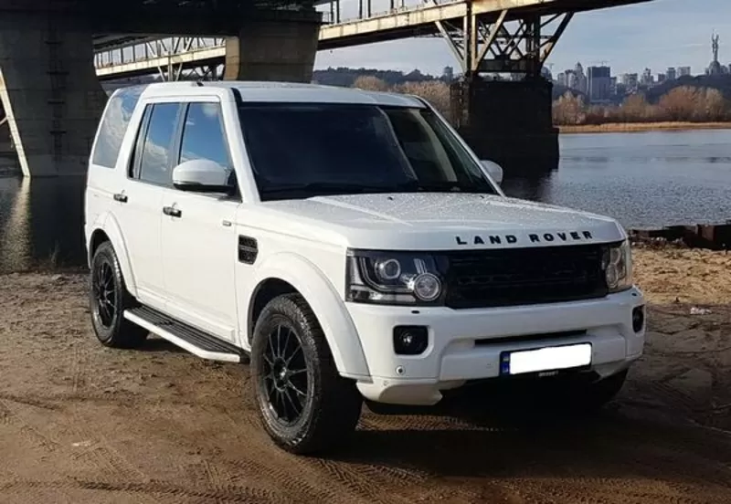 Внедорожник Land Rover Discovery 4 белый аренда 5