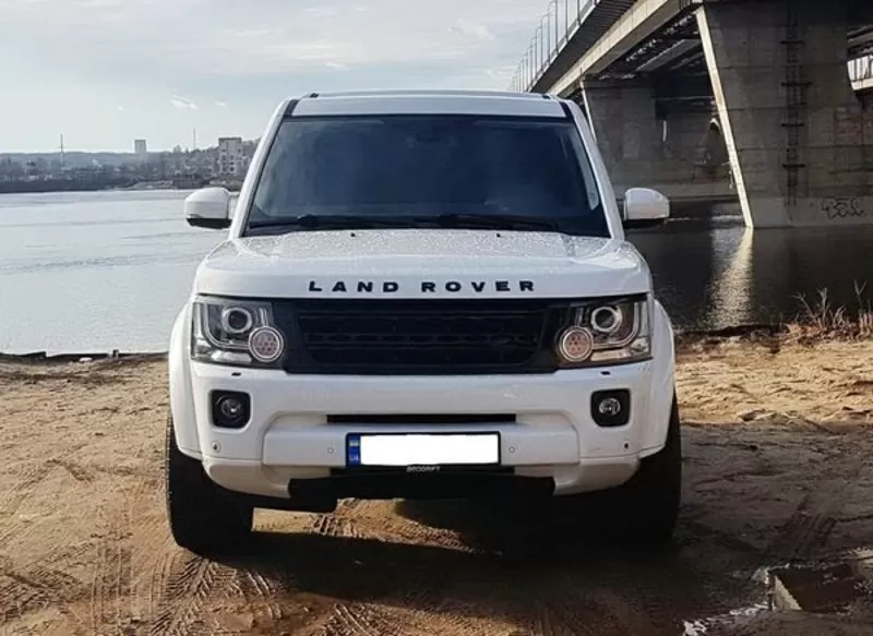 Внедорожник Land Rover Discovery 4 белый аренда 4