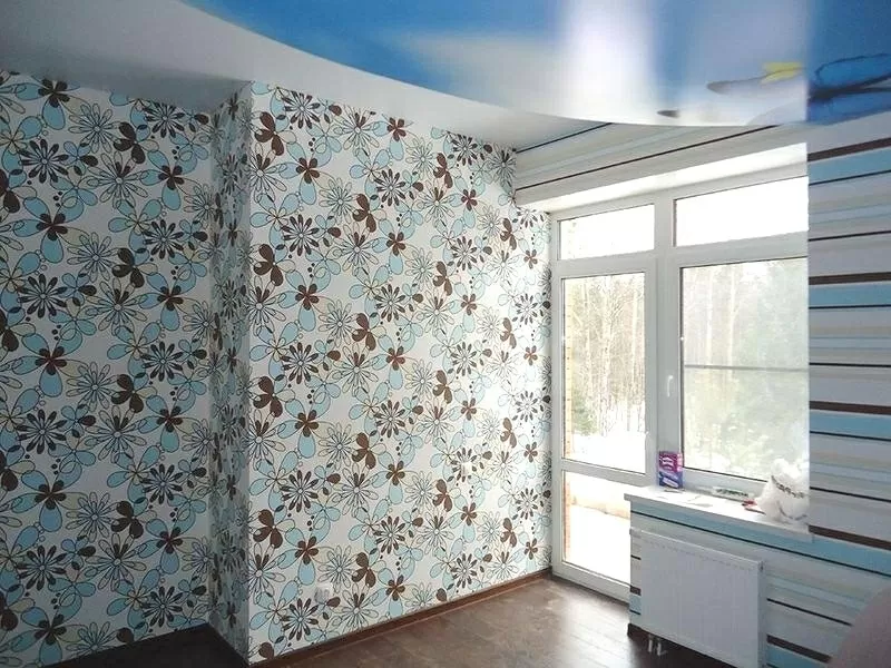 Поклейка шпалер Маляр у Києві 