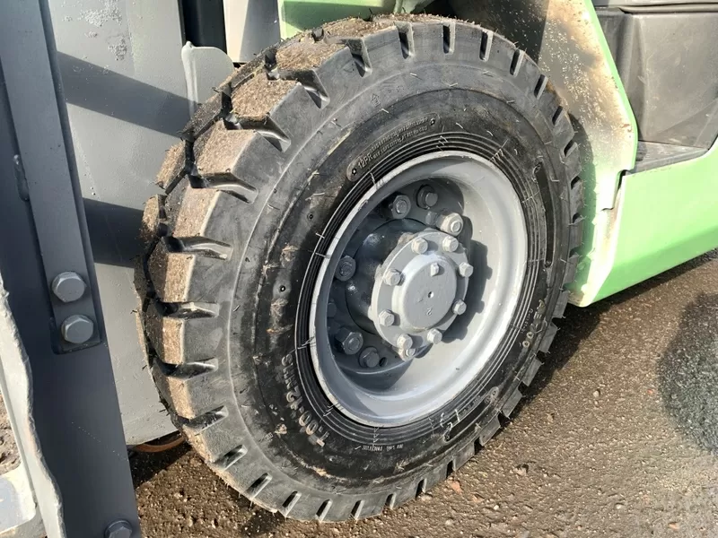 Газ-бензиновий навантажувач TCM (Nissan) з вагами 10