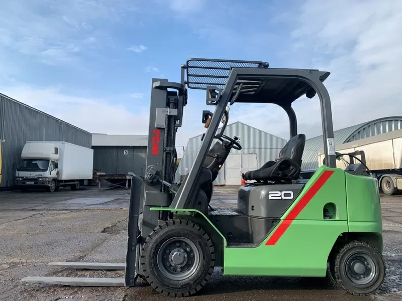 Газ-бензиновий навантажувач TCM (Nissan) з вагами