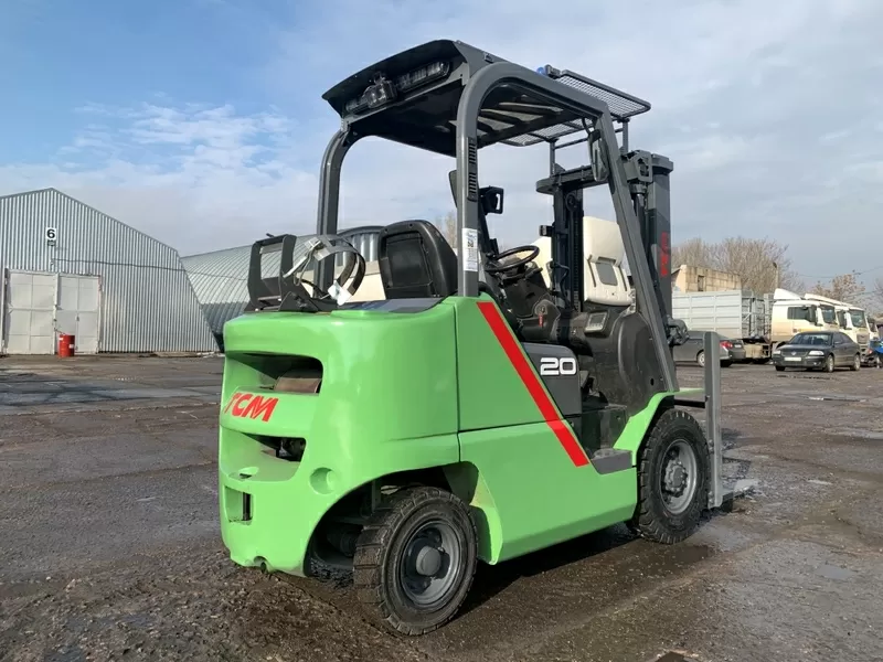 Газ-бензиновий навантажувач TCM (Nissan) з вагами 4