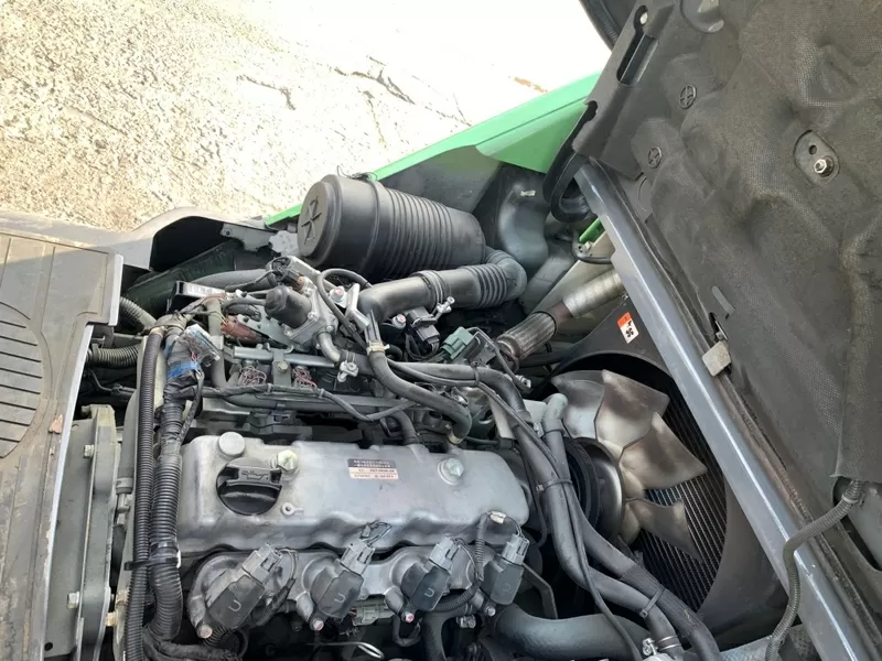 Газ-бензиновий навантажувач TCM (Nissan) з вагами 7